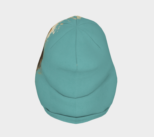 Vue de dessus de la tuque turquoise, mettant en valeur sa forme arrondie et les coutures de construction.