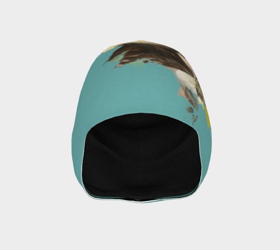Vue intérieure de la tuque turquoise montrant la doublure noire et l'extérieur en polyester à séchage rapide.