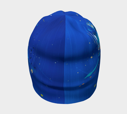 Vue de face de la tuque bleue abstraite, divisée en deux pour montrer la continuité du motif abstrait.