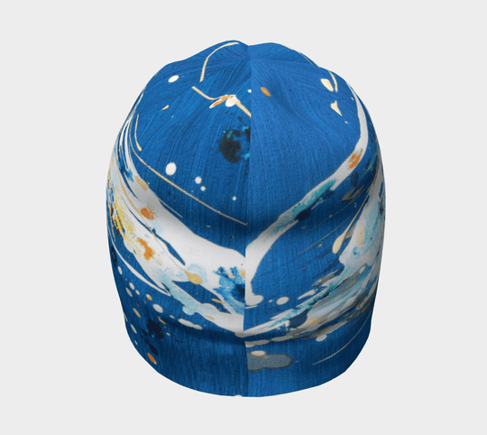 Vue de dessus de la tuque abstraite bleue, montrant le motif dynamique semblable à de la peinture.