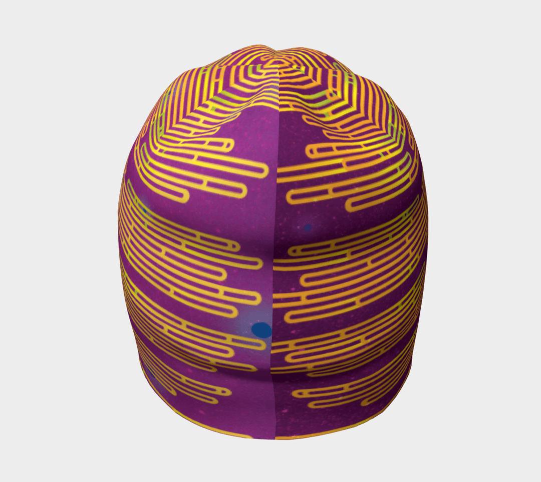 Tuque magenta à rayures abstraites jaunes et vertes vue de dessus.
