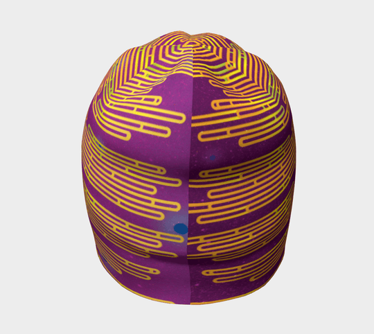 Tuque magenta à rayures abstraites jaunes et vertes vue de dessus.
