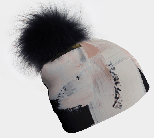 Tuque avec pompon noir et motif abstrait de coups de pinceau