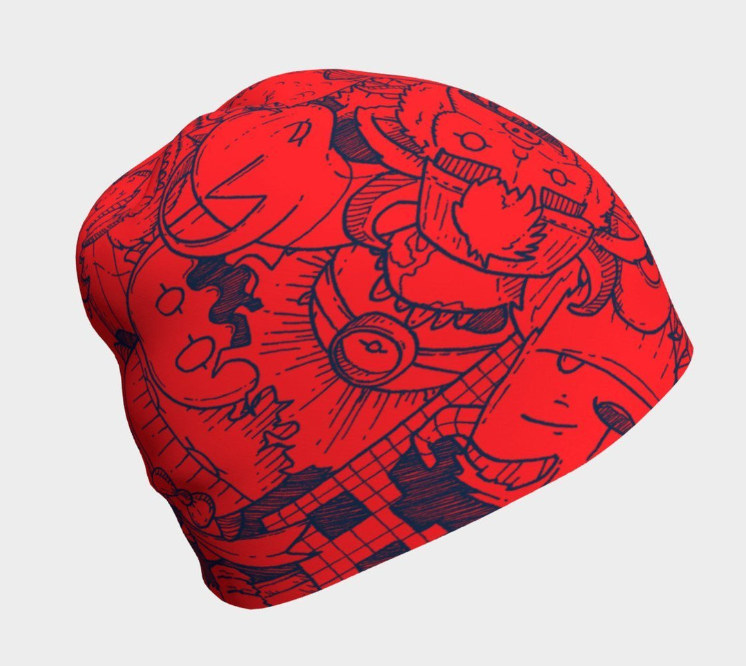 Tuque rouge avec des gribouillis de monstres bleus, vue de face.