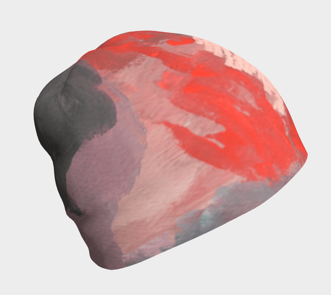 Pink and red abstract brushstrokes on a grey beanie, shown from the side.