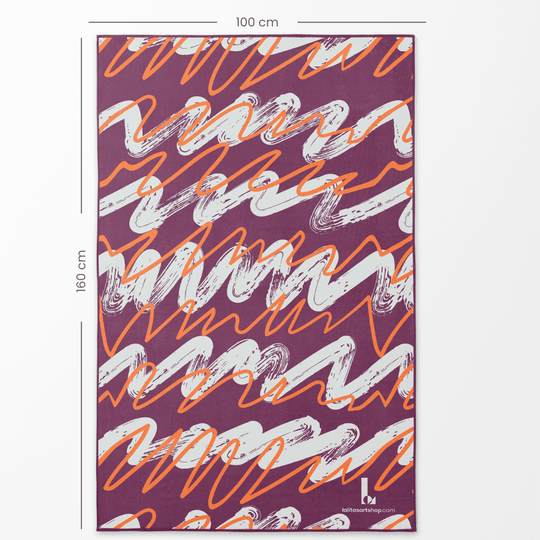 Dimensions of the XL Reversible Artistic Towel shown as 100 cm by 160 cm with linear wave art.