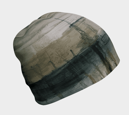 Tuque Murale avec imprimé abstrait aux tons terreux, présentée sur fond gris clair.
