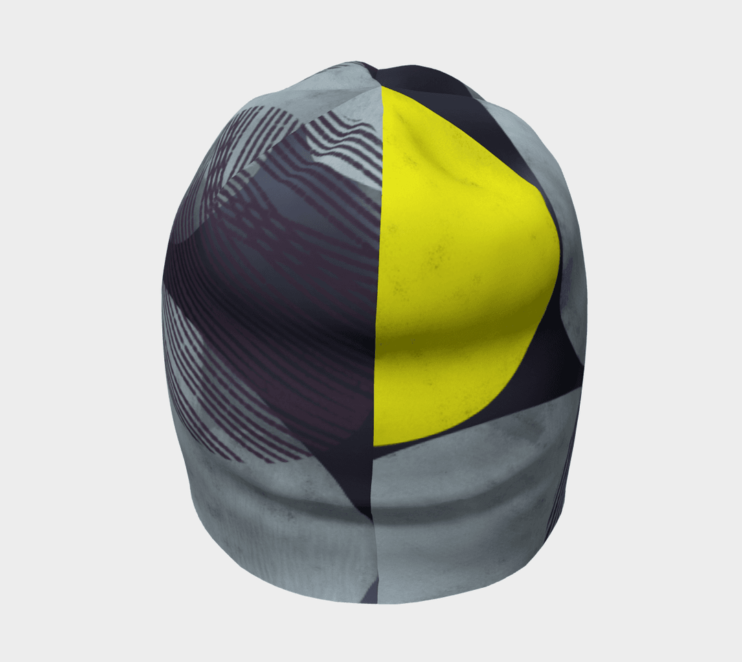 Tuque à Motifs Jaunes pour Femme, vue de face, avec un design partagé de motifs gris et de jaune vif.