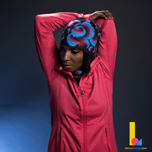 Woman stretching and wearing the Blue Flowers bamboo tuque for training and running. Paired with the Blue Flower tube anda pink running jacket