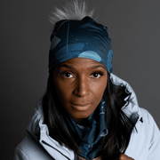 Face view of woman wearing the Lalita's Art Shop Umbrella Teal designed by Valery Goulet. This beautiful blue and grey hat four seasons is perfect for outdoors activities. 