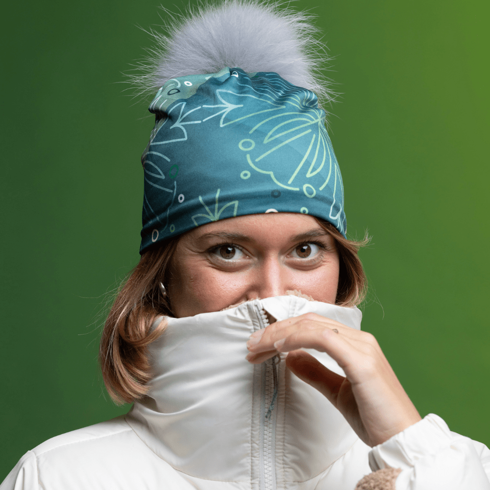 Woman wearing the new Turquoise WallPaper Pompom Beanie by Valery Goulet for the Lalita&
