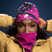 Woman facing us wearing the neck gaiter Nest as a face cover for protection. 